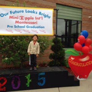 A child ready for graduation at our Montessori school in Roseville, MN-5ec856fcef