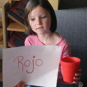 A girl learning the spanish word for red at our Montessori school in Oakdale, MN-fbefaf5ca0