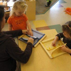 Girls playing with cloth at our Montessori school in Roseville, MN-d7e5fa00f5