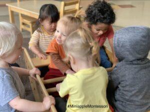 Happy Kids Playing in the Rocking Boat — Minneapolis, MN — Miniapple International Montessori